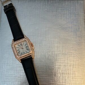 Elegant Black and Gold Women's Watch